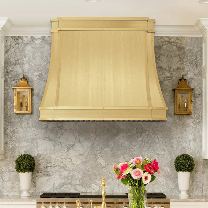 How a Handmade Brass Range Hood Transforms Kitchen Styles