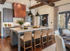 Custom handcrafted box copper range hood with concave panels for luxury kitchen