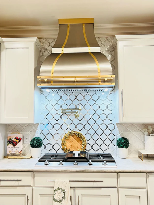 RHM Curved Stainless Steel Custom Range Hoods with Brass Accents H1-2TRM for Kavita