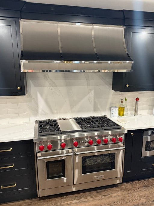 stainless steel range hood sloped design with mirror-like straps for under cabinet kitchen at RangeHoodMaster