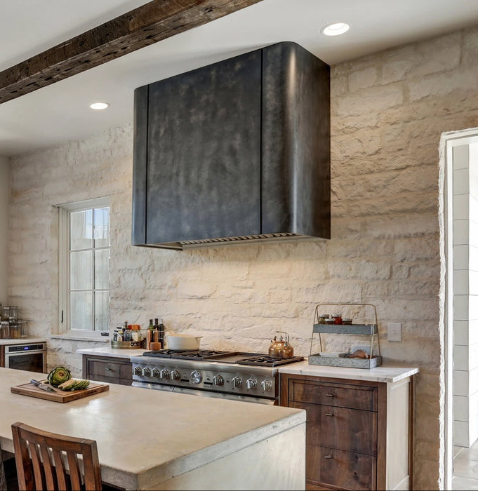 Custom antique blackened stainless steel range hood with concave lines handmade at rangehoodmaster