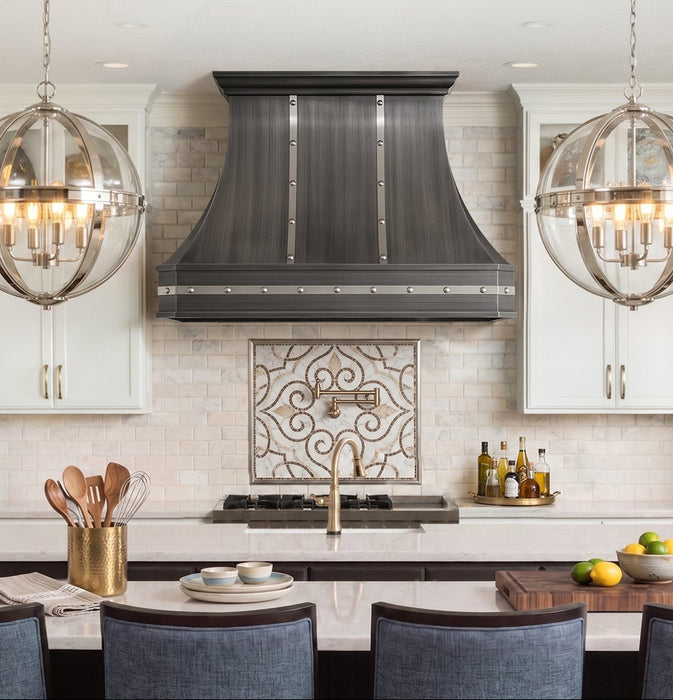 custom handmade antique brushed gray stainless steel curved range hood with brushed stainless steel straps and rivets at rangehoodmaster