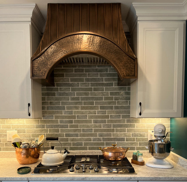 Custom Copper Kitchen Oven Hood with arched apron