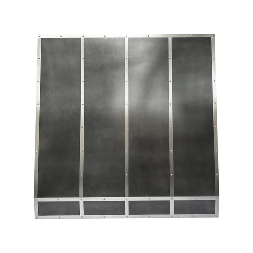 Handcrafted antique zinc custom kitchen range hood with angled design and brushed stainless steel straps and rivets at rangehoodmaster