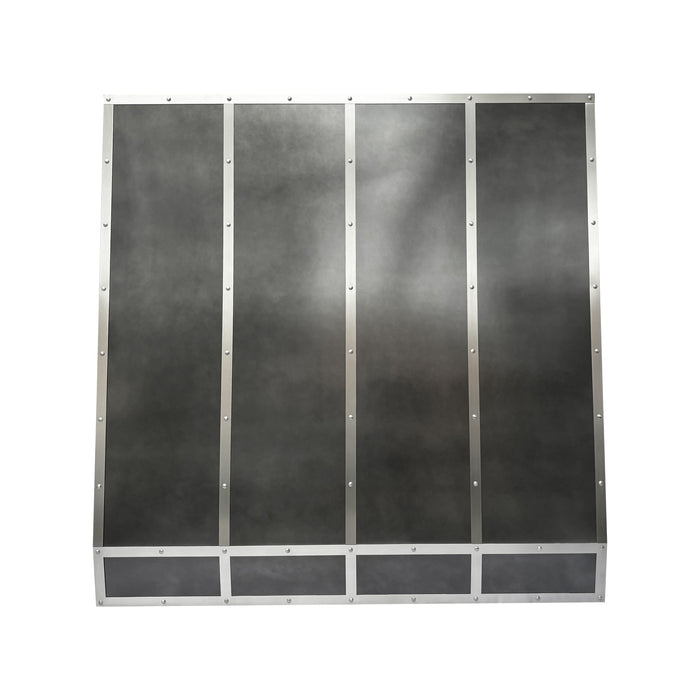 Handcrafted antique zinc custom kitchen range hood with angled design and brushed stainless steel straps and rivets at rangehoodmaster