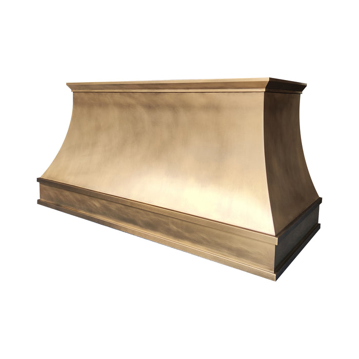 Handcrafted antique brass custom stove hood with crown molding detail in a luxury kitchen