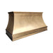 Handcrafted antique brass custom stove hood with crown molding detail in a luxury kitchen