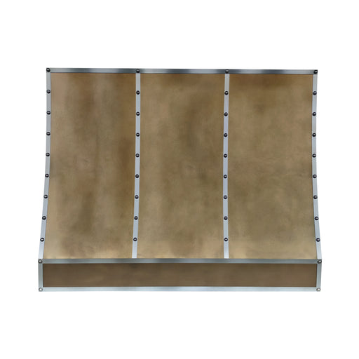 Handcrafted antique brass farmhouse range hood with stainless steel accents in a luxury kitchen