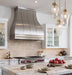 custom brushed stainless steel bell shaped modern range hood with straps and brass pot rack at rangehoodmaster