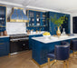 Custom California Seashore Blue range hood with polished brass trim in a luxury coastal kitchen