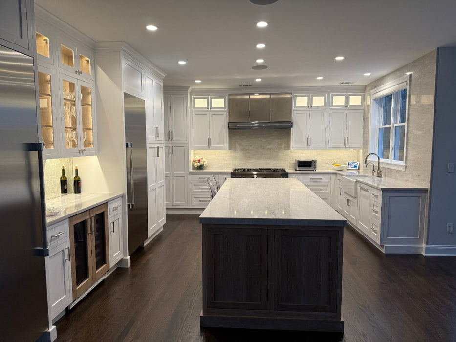 rangehoodmaster brushed stainless steel classic sloped shape with polished stainless steel mirror like straps & rivets & pot rail tailored for New York homes