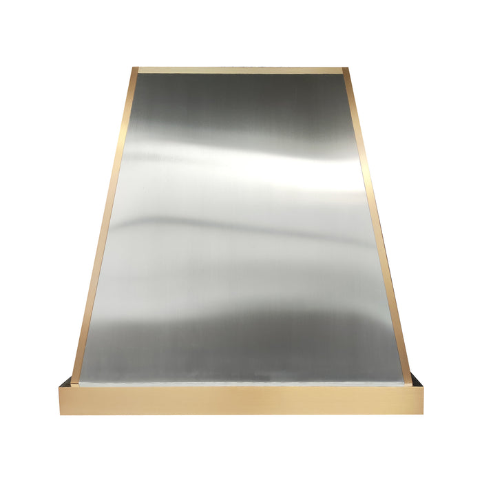 Classic tapered stainless steel custom range hood with brushed brass apron and edge trim by Range Hood Master for luxury kitchens.