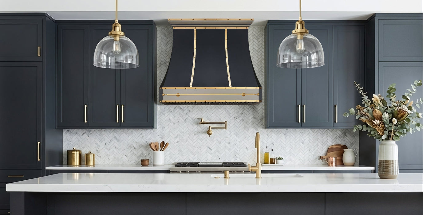 custom satinless steel range hood in matte black painted body with brushed brass and brushed stainelss steel straps and rivets and pot rail at RangeHoodMaster