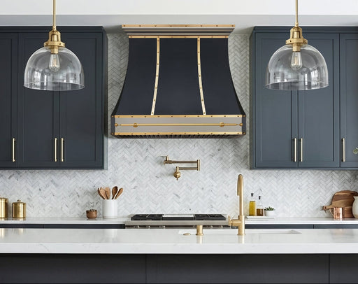 custom satinless steel range hood in matte black painted body with brushed brass and brushed stainelss steel straps and rivets and pot rail at RangeHoodMaster