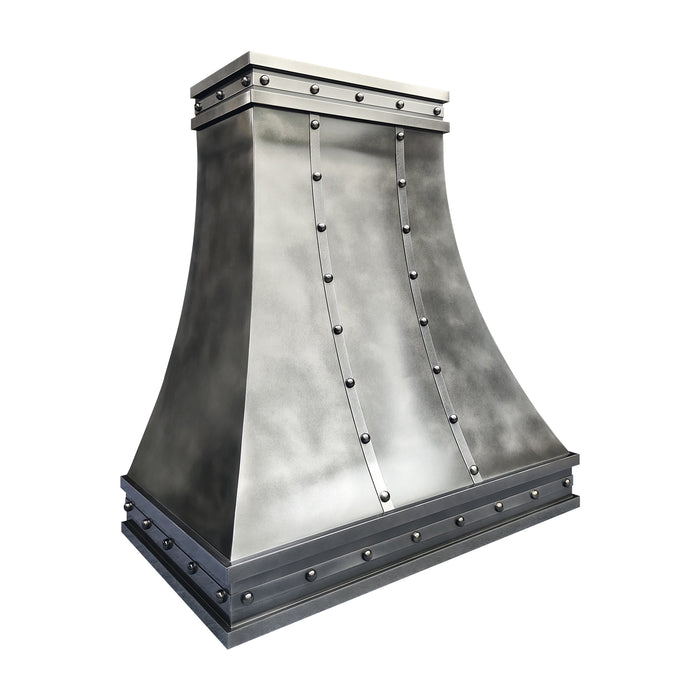Custom antique blackened zinc curved range hood with stainless steel straps and rivets in industrial kitchen style