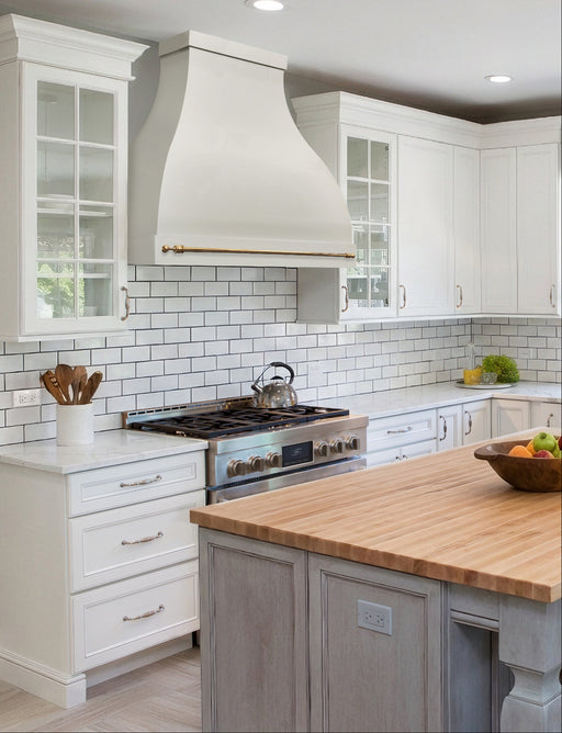 custom painted stainless steel glossy white range hood bell shape with crown and apron and gloden brushed brass pot rail at rangehoodmaster