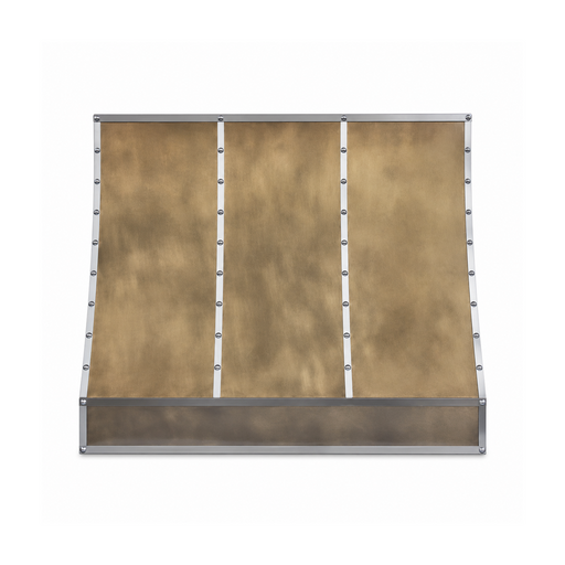 sloped antique brass stove hood with stainless steel straps and round rivets front view