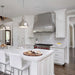 wall mounted stainless steel range hood with polished straps rivets