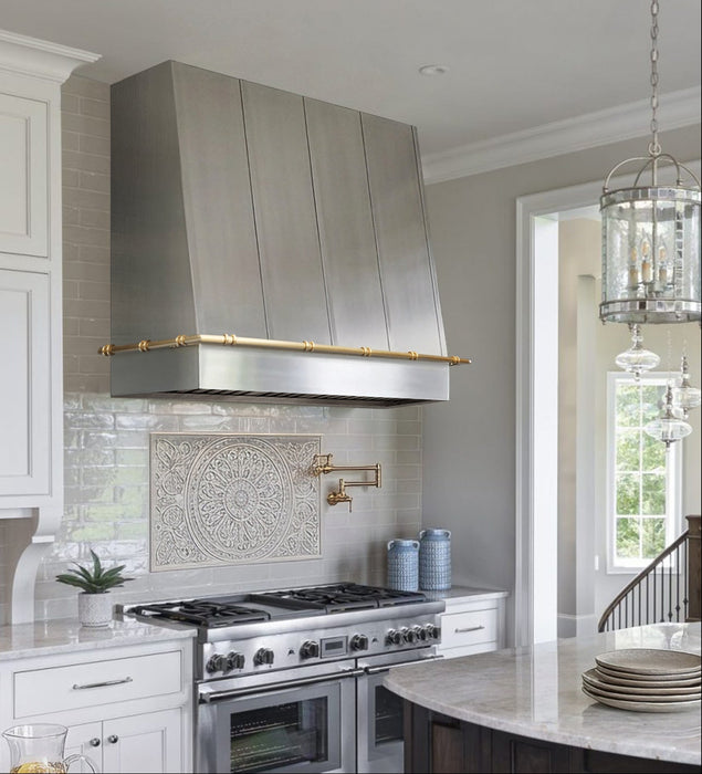 custom stainless steel range hood angled shape with straps and custom pot rail design at RangeHoodMaster