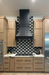 stainless steel range hood matte black color with straps and round rivets for high ceiling