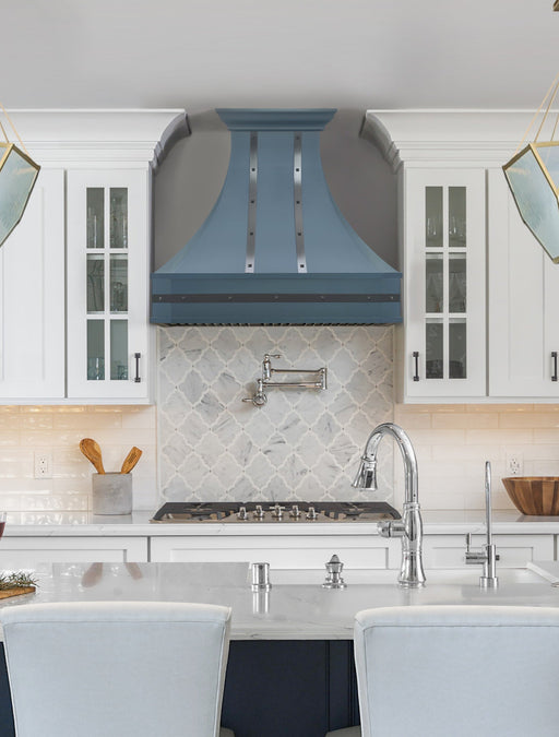 stainless steel range hood with custom blue color and bronze accents