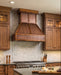 custom farmhouse copper range hood with wood trim angeld shape with rivets at rangehoodmaster
