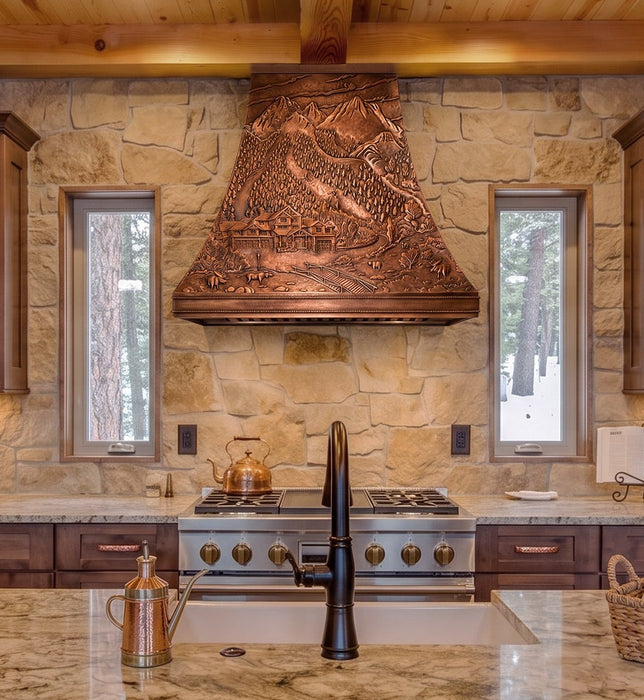 handmade copper range hood with forest stilt house design at rangehoodmaster
