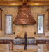 handmade copper range hood with forest stilt house design at rangehoodmaster