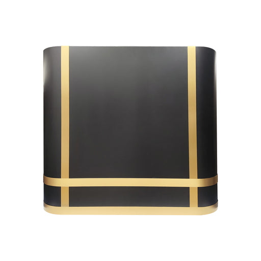 Handmade matte black custom range hood with curved iconic design in a modern luxury kitchen