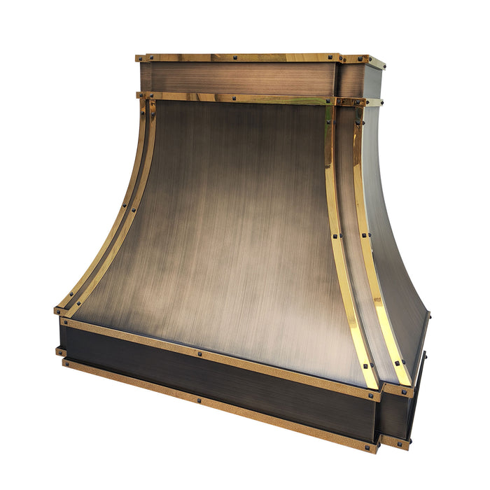 custom brass range hood in luxury brushed antique brass finish with polished brass straps and black square rivets at RangeHoodMaster