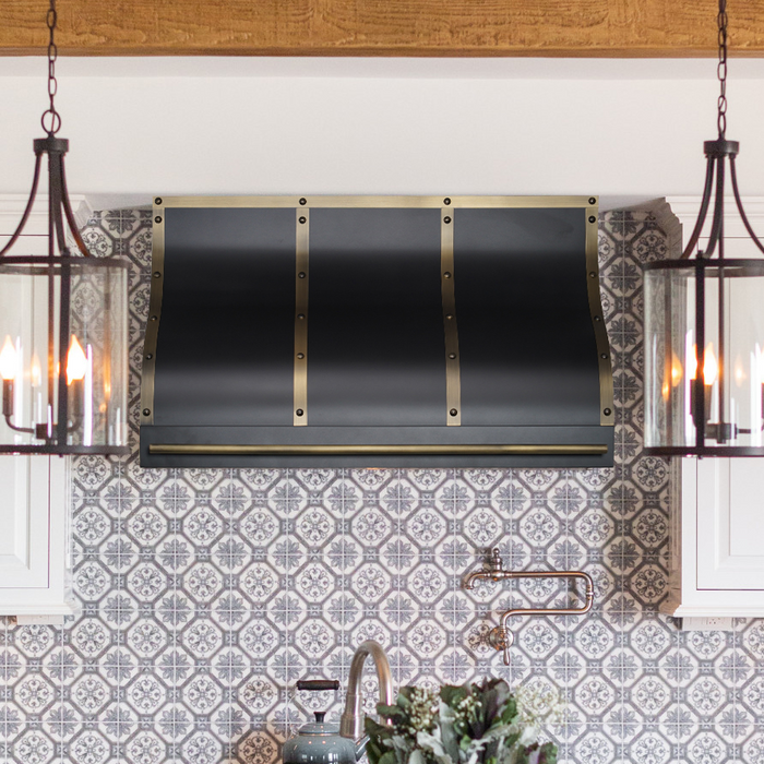 Ogee shaped black stainless steel range hood under cabinet mounted with antique style and brass decorations