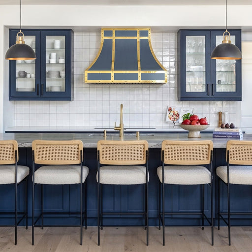 wall mounted stainless steel range hood with pilished brass accents