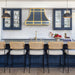 wall mounted stainless steel range hood with pilished brass accents