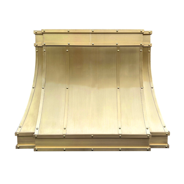 Custom brass range hood modern curved design with straps and rivets at RangeHoodMaster