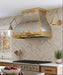 Custom brushed stainless steel bell range hood with golden polished brass straps rivets and pot rail handmade at rangehoodmaster