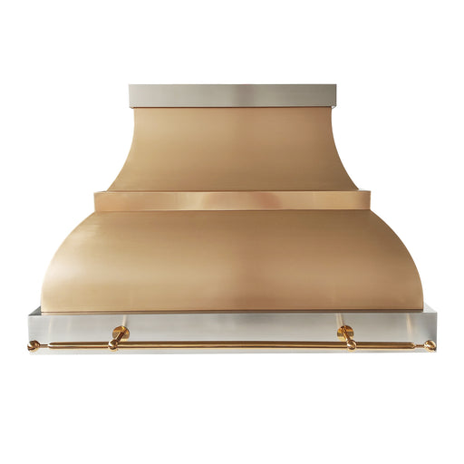 Custom warm brass range hood with luxury pot rack in designer kitchen interior