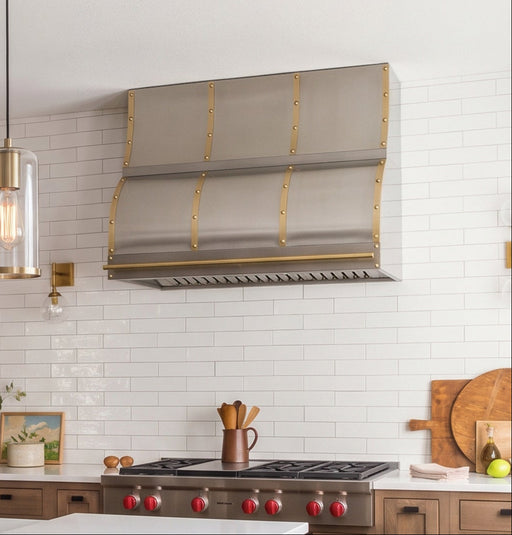 rangehoodmaster ogee shape range hood with brass accents